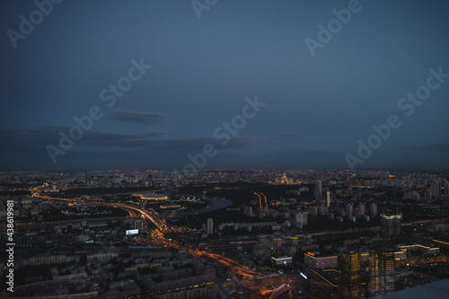 Night aerial view of the Moscow city traffic. View from the observation platform of the business center of Moscow City. Photography from a height of 354 meters.