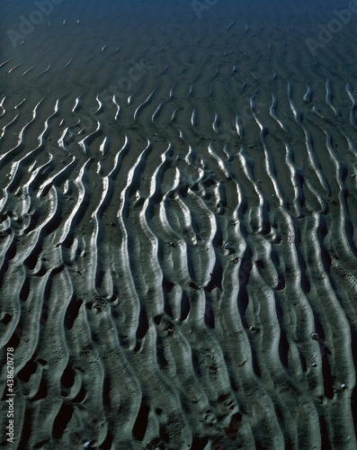 sea, low tide, mudflat, detail, ripple marks, tide, sand, sandy beach, beach, ripples, wave furrows, grooves, water, pattern, texture, 