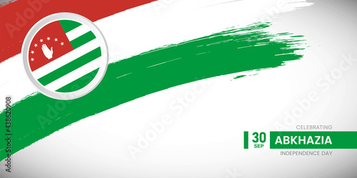 Creative brush stroke with flag of Abkhazia country. Happy Independence day background with grunge flag