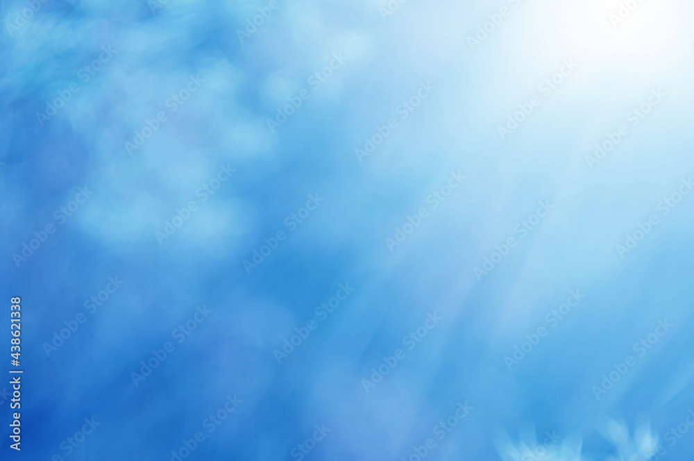 Light blue Leaf background. Blurred leaves and circular bokeh. Abstract for design and wallpaper. Light blue Leaf background. Blurred leaves and circular bokeh. Abstract for design and wallpaper.