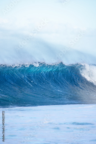 Big blue wave about to break on the sea in Reunion Island