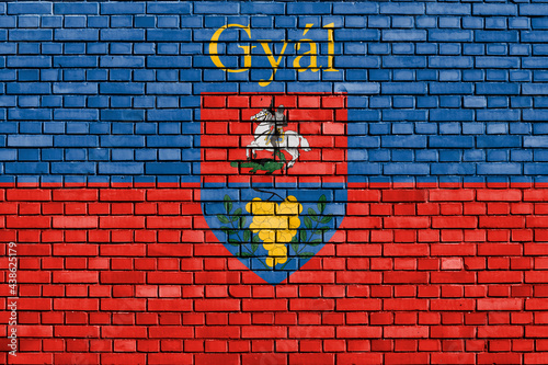 flag of Gyal painted on brick wall