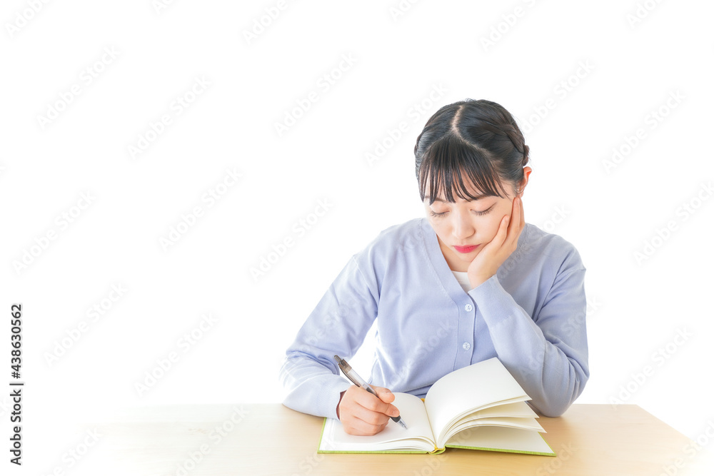 悩む若い女子学生 悩む若い女子学生
