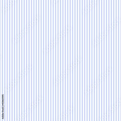 Seamless pinstripe pattern.  Thin vertical white and light blue stripes. photo