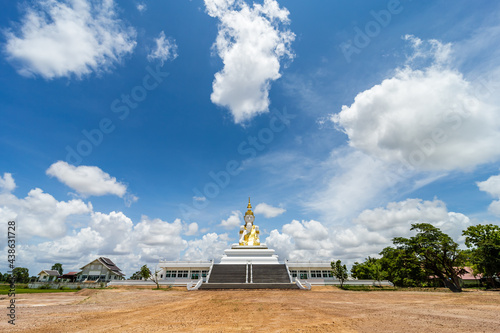 Big Buddha statues on a sunny day with clear blue sky  Sisaket Province  Thailand.