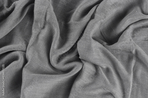 Crumpled textured grey fabric background