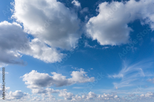 The sky with clouds. Blue sky and clouds. White clouds in the blue sky.