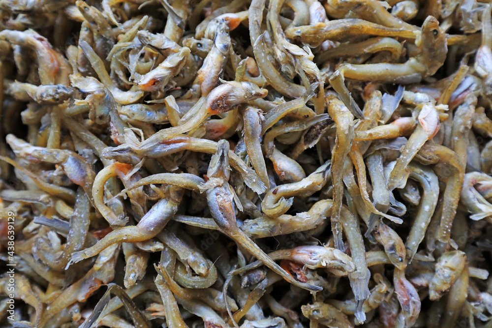Dried fish piled together in the seafood market in North China Dried fish piled together in the seafood market in North China