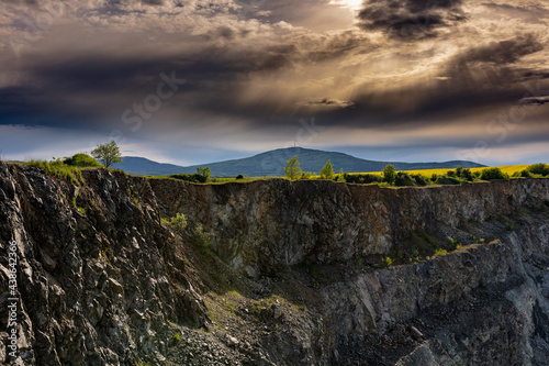 Mount Sleza and the quarry - before the rain - dramatic sky - Poland