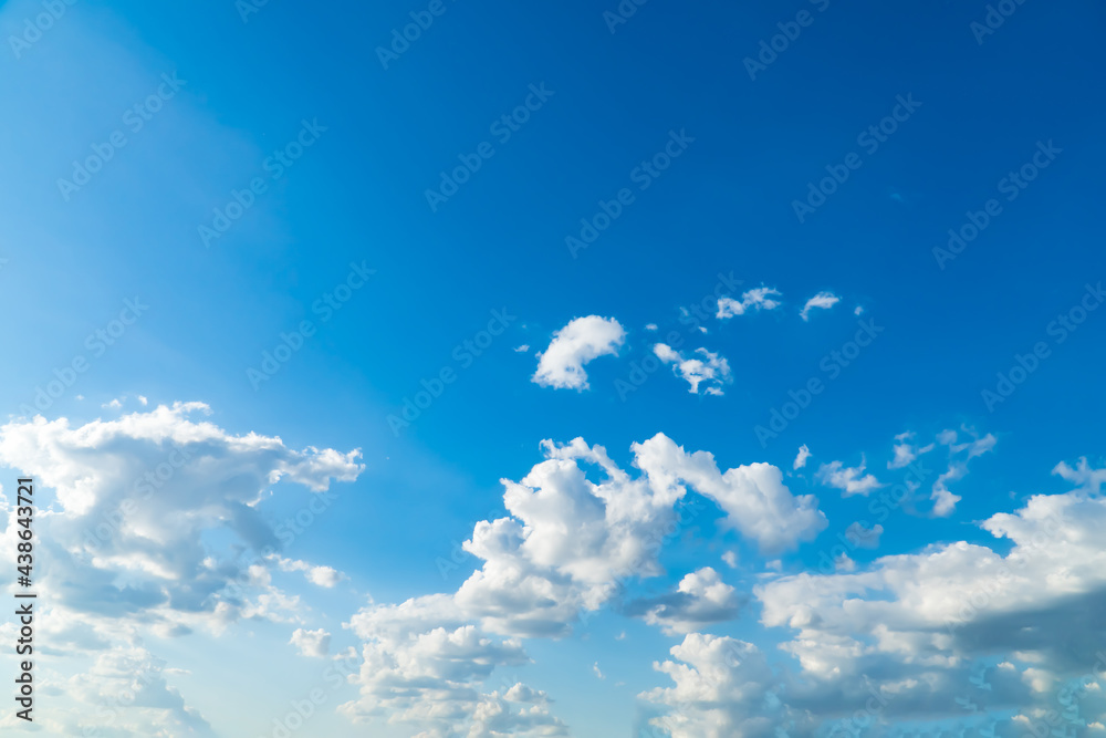 Blue sky with beautiful natural white clouds. Space for text. Background. Blue sky with beautiful natural white clouds. Space for text. Background.