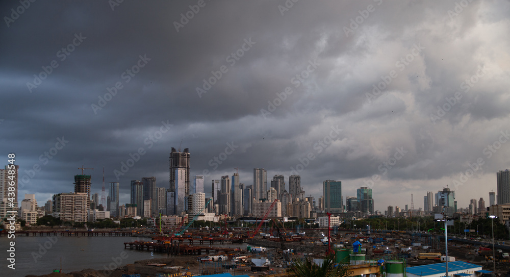 Fototapeta premium Dramatic, Monsoon clouds rolling over south mumbai, areas of lower parel, haji ali and worli.