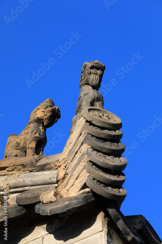 Ancient brick carving works in the background of blue sky  North China