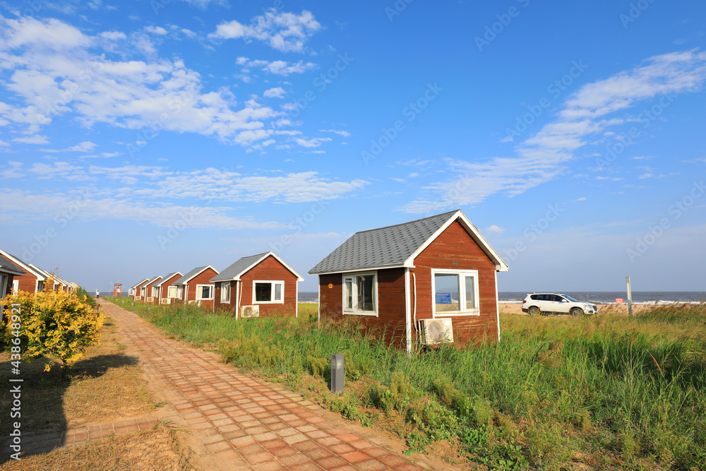 The wooden house in the background of blue sky