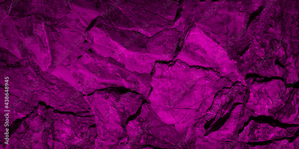 Abstract geometric background. Toned rock texture. Vintage deep purple background with copy space for design. Web banner. Combination of rough mountainous surface with cracks and magenta color.
