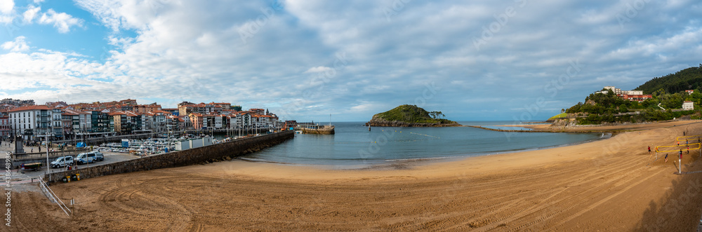 Panoramic of the Island of San Nicolas at low tide from Isuntza beach in Lekeitioi, landscapes of Bizkaia. Basque Country