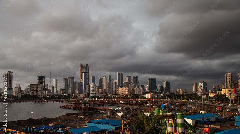 Naklejka premium Dramatic, Monsoon clouds rolling over south mumbai, areas of lower parel, haji ali and worli.