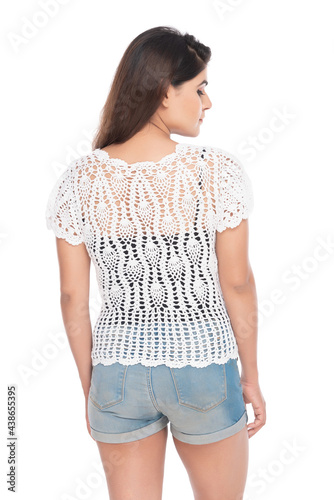 Lifestyle of a Indian woman, wearing hot pants and crochet jacket