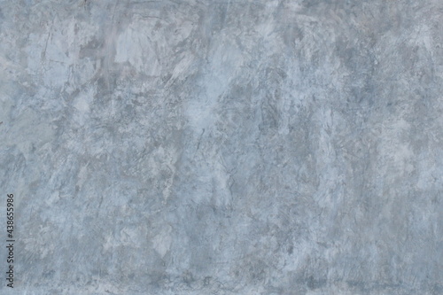 The background and texture of the gray cement plaster wall has an interesting pattern