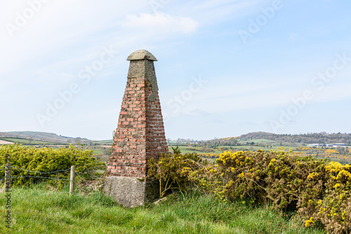 Large brick built navigation aid used to guide shipping, around 250 years old. photo