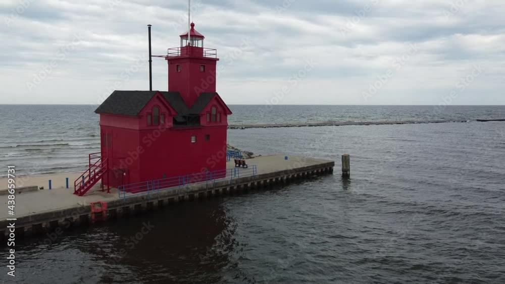 Aerial of Holland red lighthouse on Lake Michigan