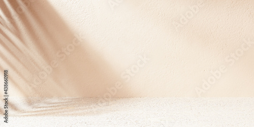 Empty room wall with texture tropical leaves shadow, minimal pastel beige summer abstract background for product presentation and object display. 3d rendering