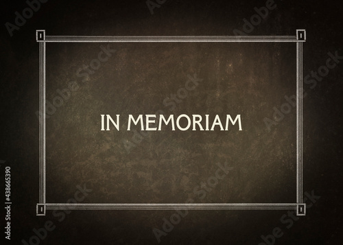A re-created film frame from the silent movies era with the intertitle text: In memoriam. Sober retro vintage textured item.
 photo