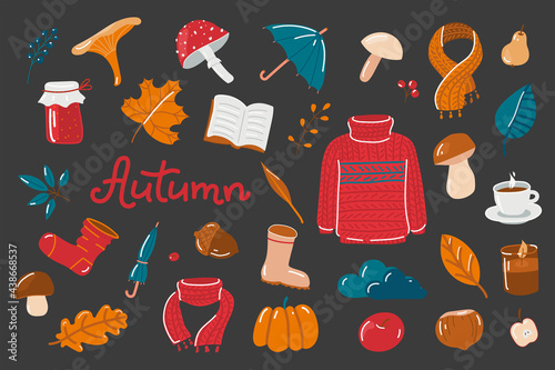 Set of vector hand-drawn autumn elements in warm colors on a dark background Collection of isolated seasonal icons: scarf, leaves, mushrooms, berries, jam, sock, shoes, umbrella, tea, acorn, nut.