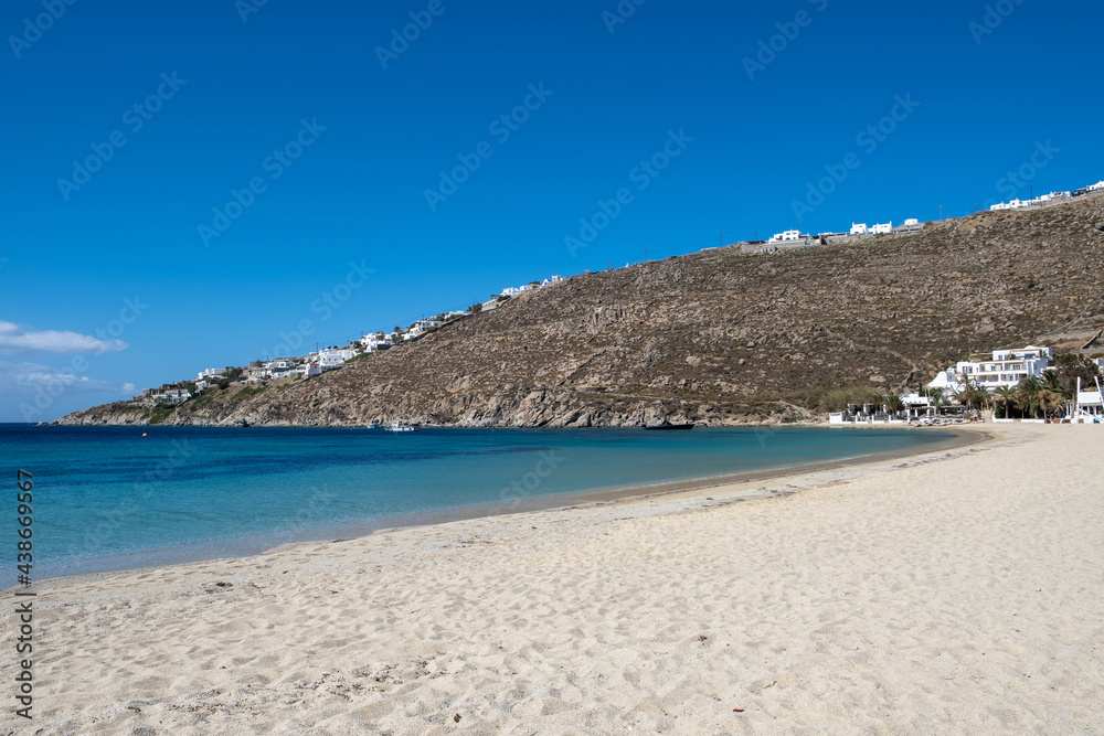 Mykonos island, Cyclades. Greece. Psarou sandy beach, summer holidays concept Mykonos island, Cyclades. Greece. Psarou sandy beach, summer holidays concept
