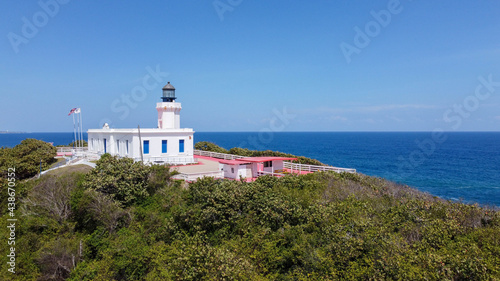 The Arecibo Lighthouse or Faro de los Morrillos is a historic lighthouse located in the city of Arecibo, Puerto Rico. Its name comes from its location on a rocky promontory called Punta Morrillos. photo