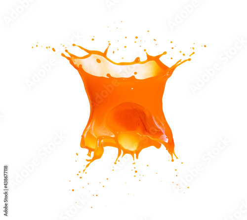 Splashes of orange fruit juice, isolated on a white background