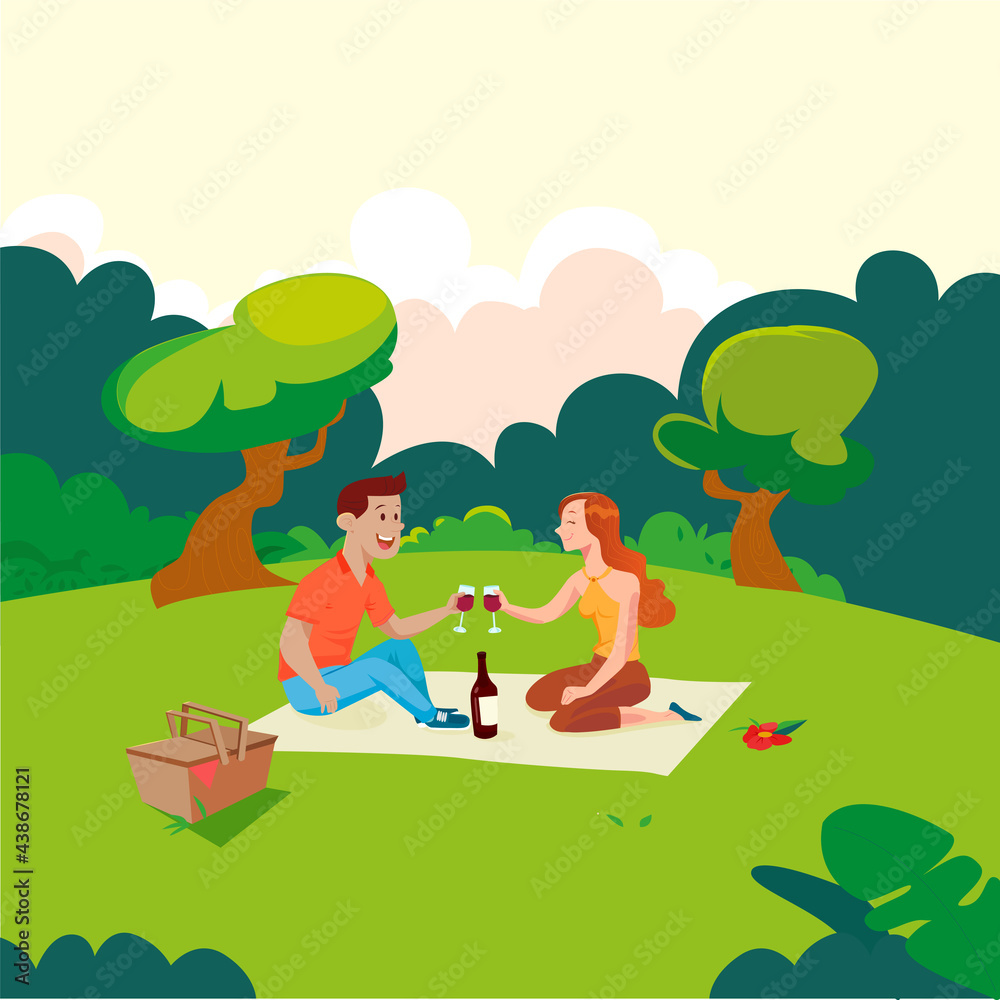 Picnic couple enjoying a glass of wine in the park