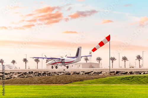 Fotografi The wind sock shows the speed and shear at the airfield during the takeoff of a
