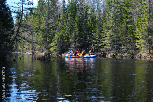 a group of tourists sailing on a catamaran