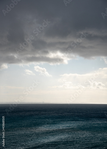Stormy sky with dramatic clouds and sea. Stormy weather at the ocean © Michalis Palis