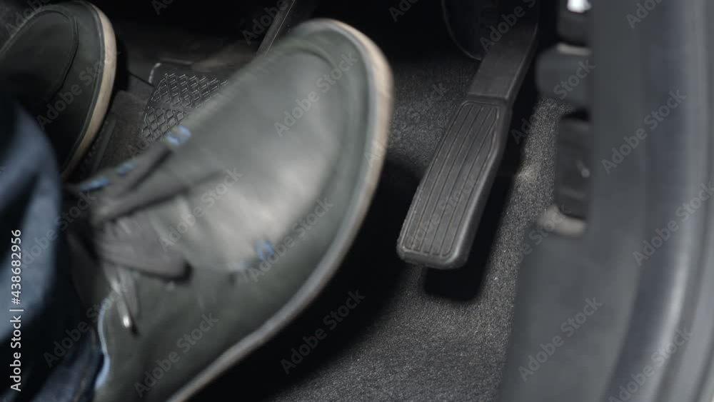Vidéo Stock Car foot pedal. Accelerator and break pedal in a car. Close