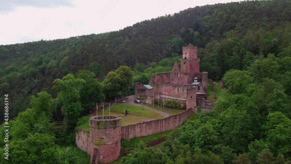 Ruins of a German fortress on a green hill top view