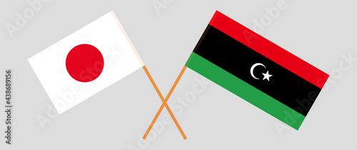 Crossed flags of Japan and Libya. Official colors. Correct proportion