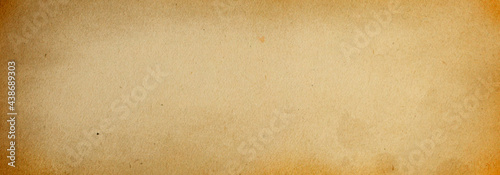Old blank grunge background of brown paper with vignette