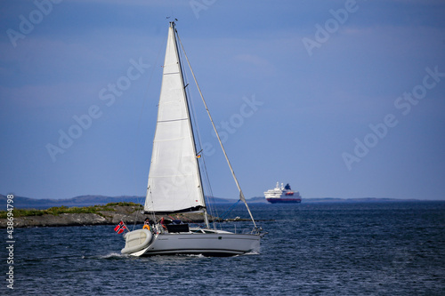 Sailboat with wind in the sails along the Norwegian coastBrønnøysund,Helgeland,Nordland county,Norway,scandinavia,Europe 