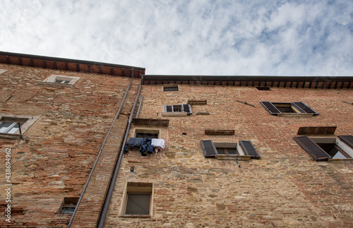 Historical architecture buildings, Montepulciano, city Tuscany, Italy against blue sky