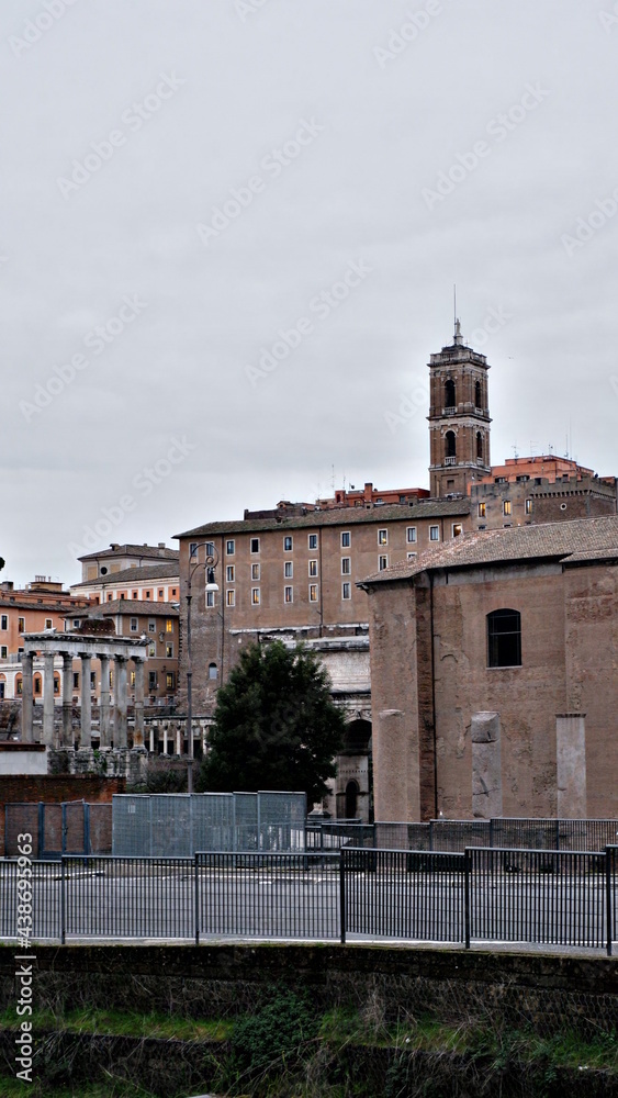 Italy, Rome, upward view in backlight of the facade and bell towers