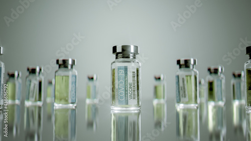 Covid-19 vaccine, canister and syringe