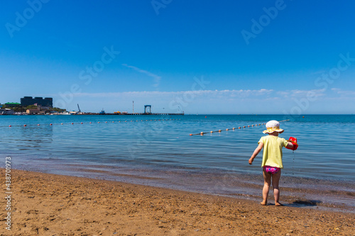 Anapa. Krasnodar Region - May 14, 2021: a child plays on the Black Sea coast