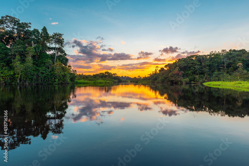 Amazon rainforest sunset with copy space. Amazon river basin located in Brazil, Bolivia, Colombia, Ecuador, French Guyana, Peru, Suriname, Venezuela. photo
