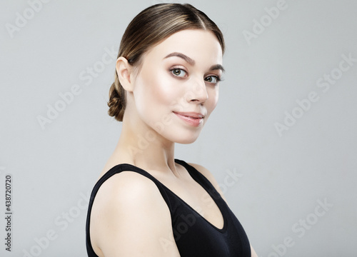 Healthy fresh skin face, beautiful woman close up face with clean skin over grey background