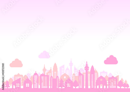 ピンク色の街並みと雲背景