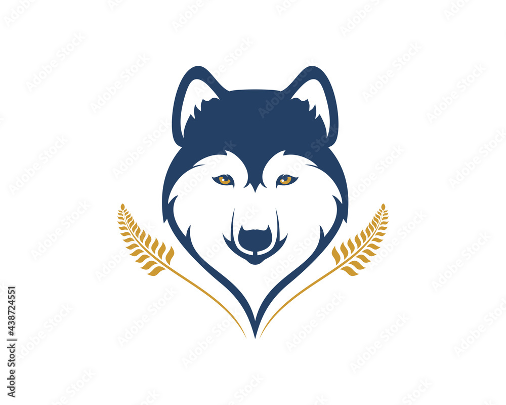 Obraz premium Wolf head with wheat beside