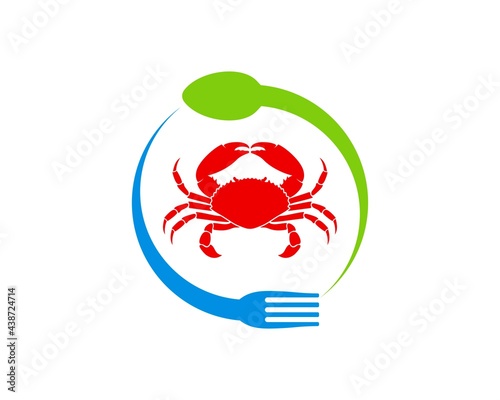 Circular spoon and fork with red crab inside