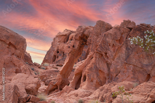 Wide angle horizontal view of Elephant Rock  against a colorful dramatic sky  in Valley of Fire State Park in Nevada. 