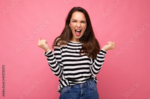 Εκτύπωση καμβά Portrait of young positive happy beautiful brunette woman with sincere emotions
